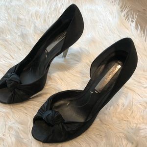 Black satin peep toe pumps